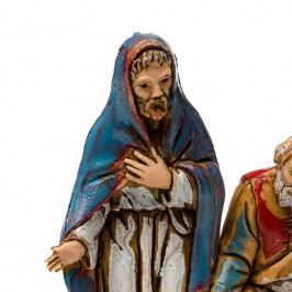 Pastori seduti vicino al Fuoco per il Presepe