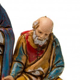 Pastori seduti vicino al Fuoco per il Presepe