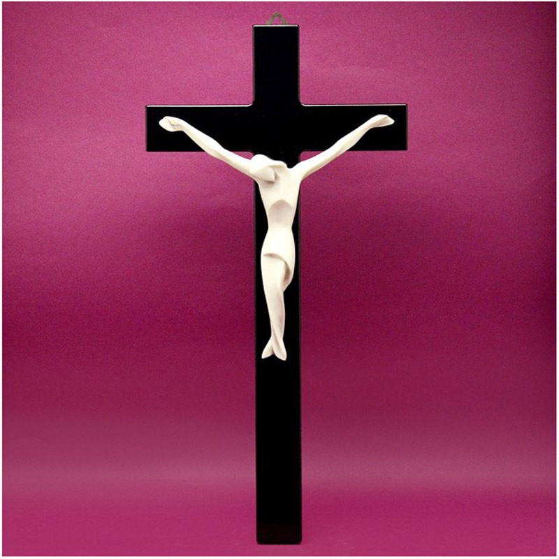 Crocifisso in legno laccato nero, e corpo del Cristo stilizzato moderno color avorio.